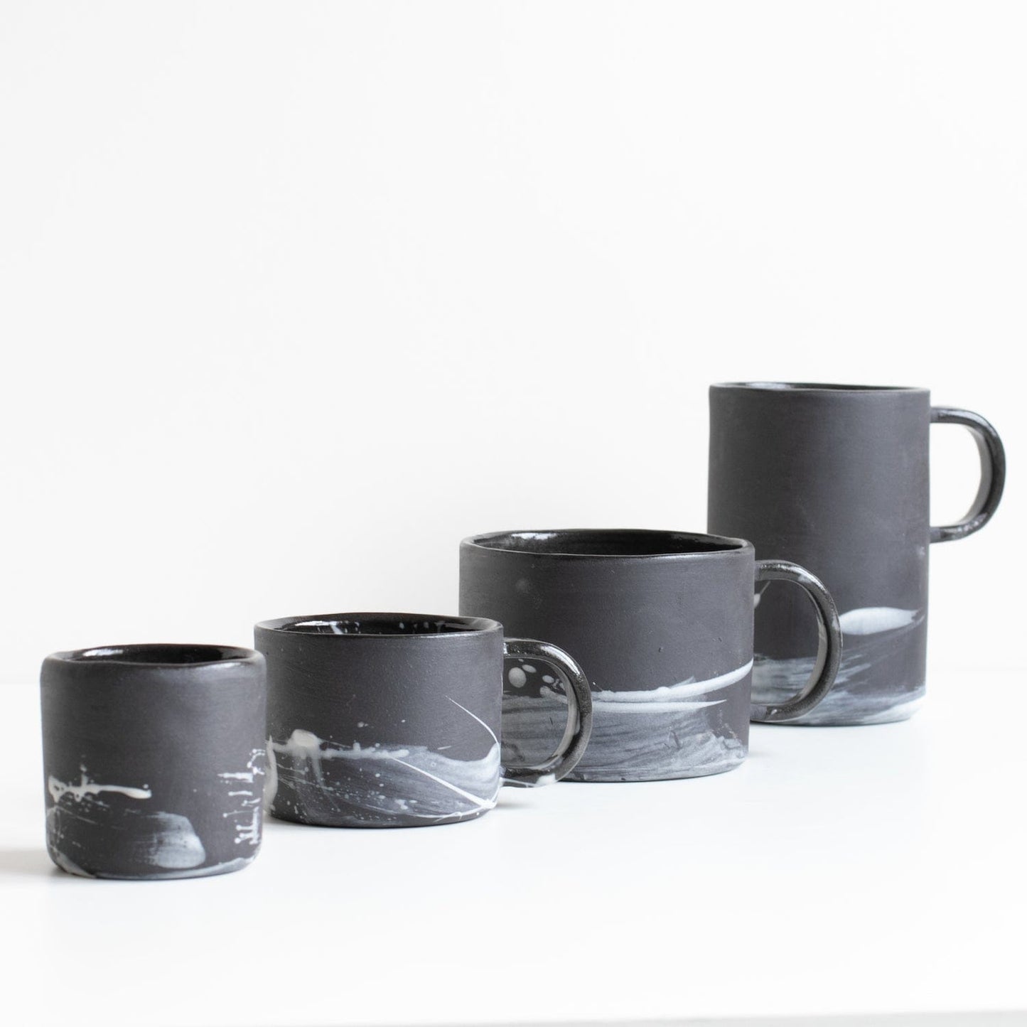 Naked Clay Ceramics Regular Mug 'Spirit' (Black Clay with Porcelain brushstrokes)